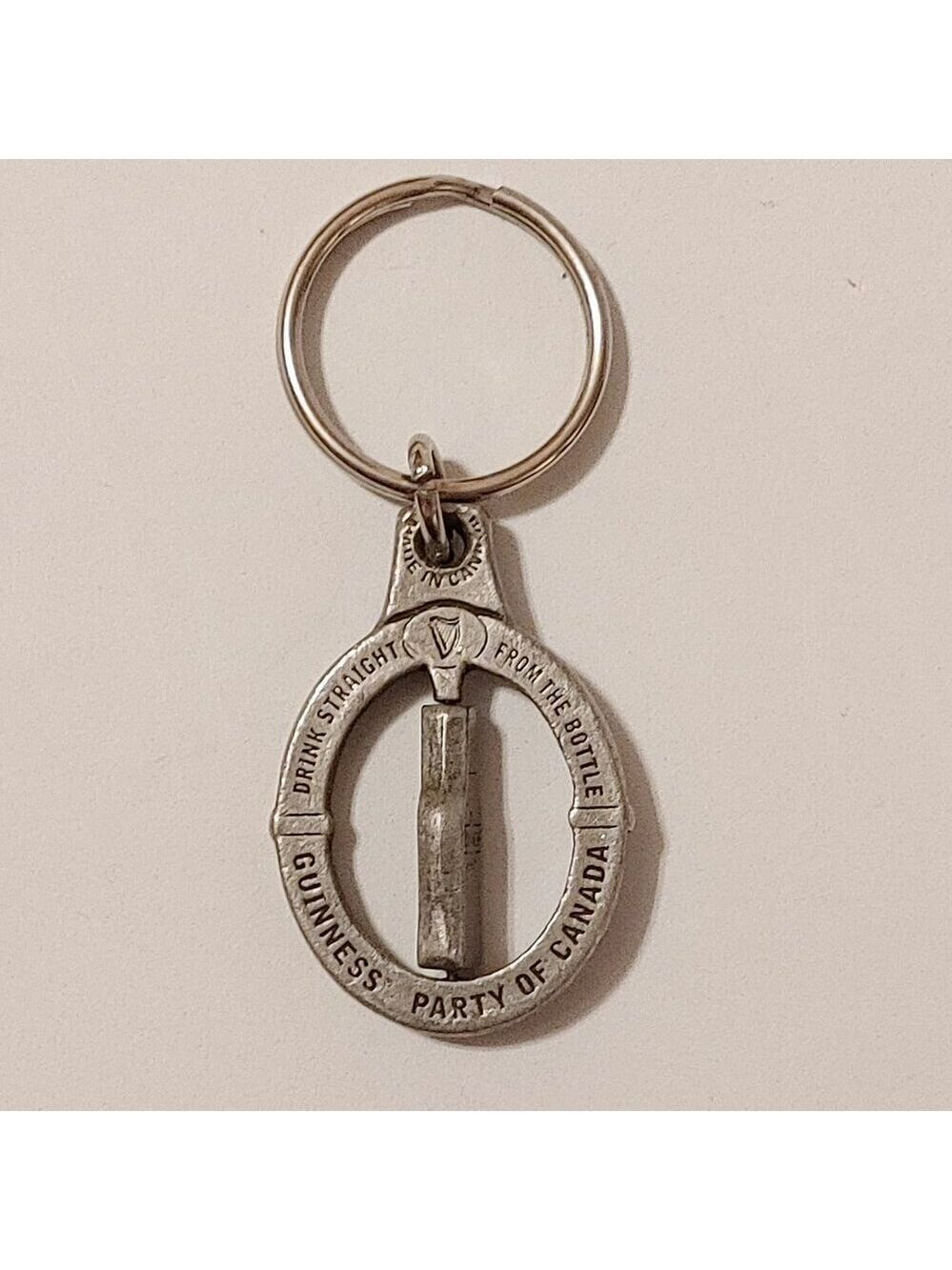 PEWTER GUINNESS STOUT Bottle Keychain SPINNER SPINNING MIDDLE Bottle Made in CAN